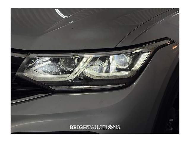 Volkswagen tiguan r-line business 1.5 tsi dsg 149pk 2022 (origineel-nl), r-076-sj - afbeelding 19 van  42